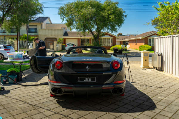 preparing a Ferrari for the best paint correction in adelaide